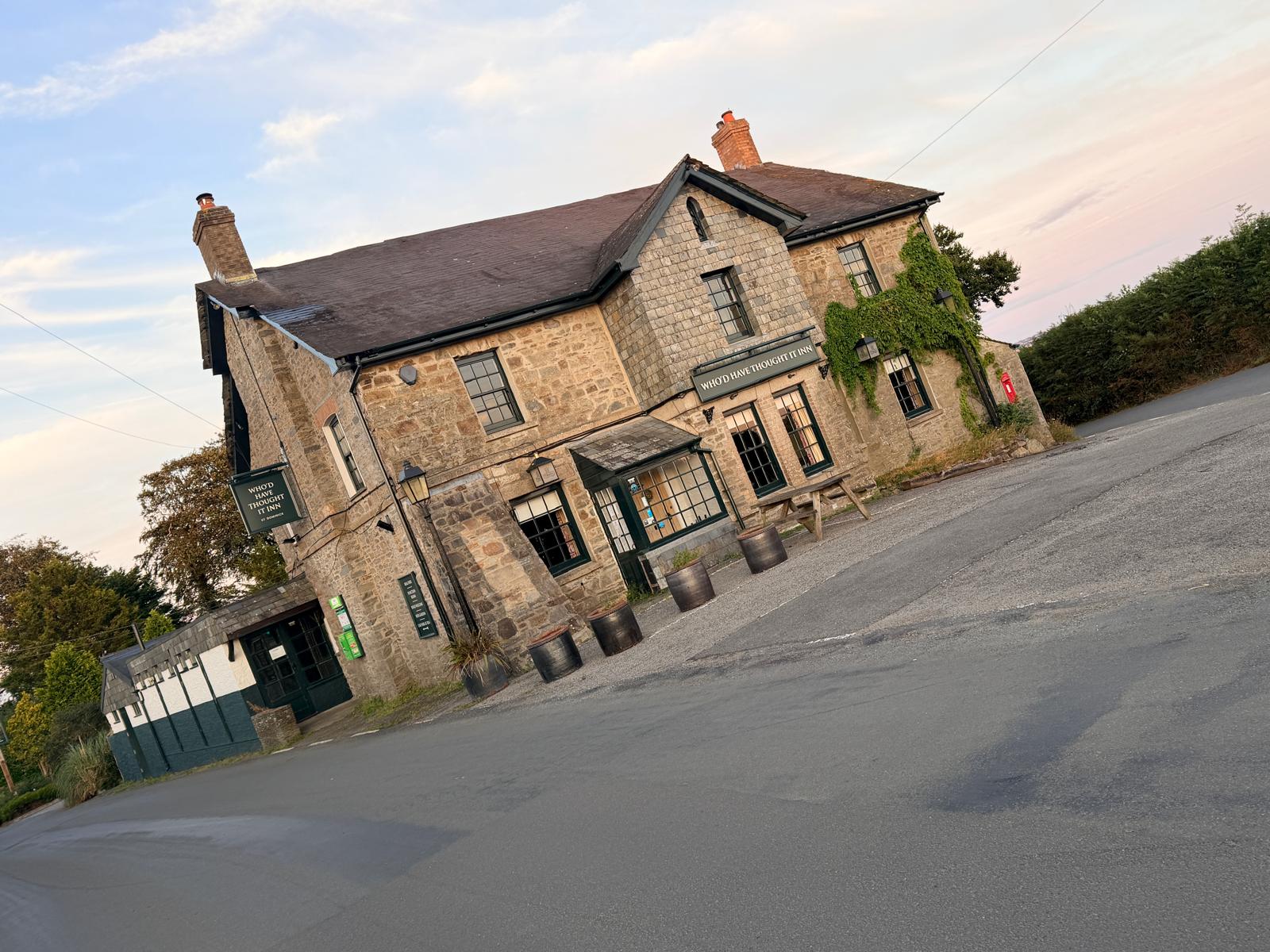 The pub and grounds where the letting pods sit, above the Tamar Valley